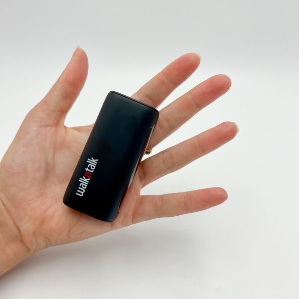 Woman holding a 5K Power Bank in the palm of her open hand