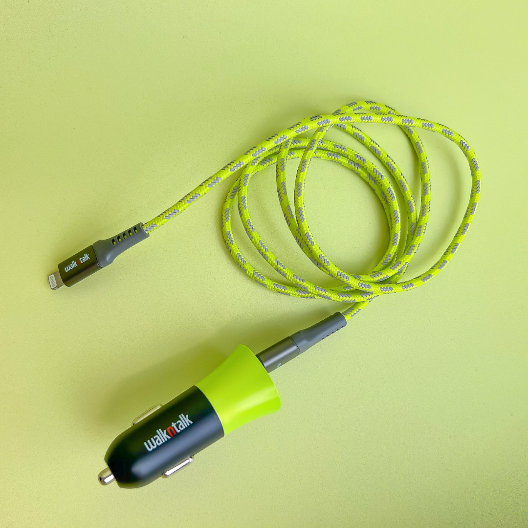 Hi Vis Car Charger Dual USB Yellow plugged into a wire on a yellow background